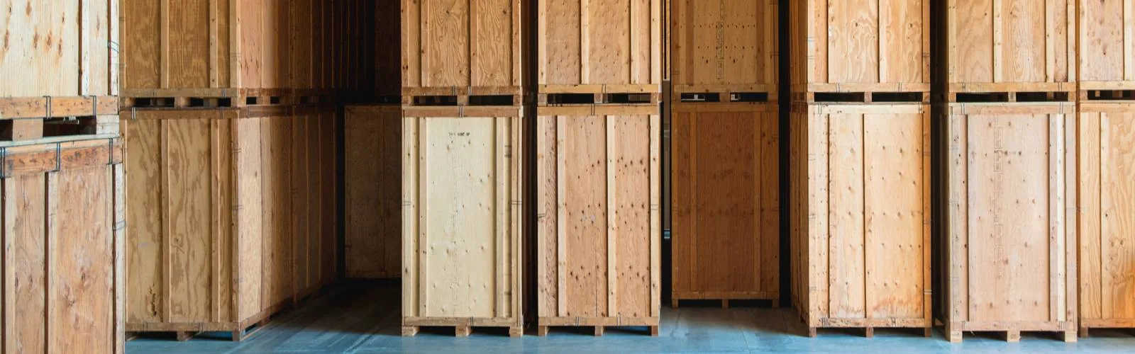 Rows of large wooden shipping crates