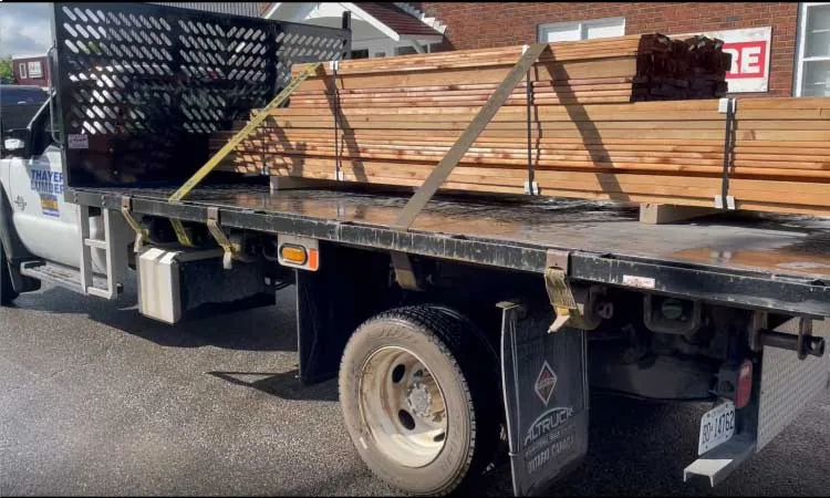 Milled lumber loaded and strapped for shipping